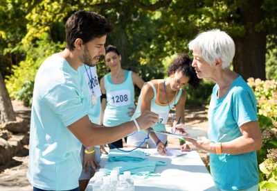 Athletes registering themselves for marathon in the park